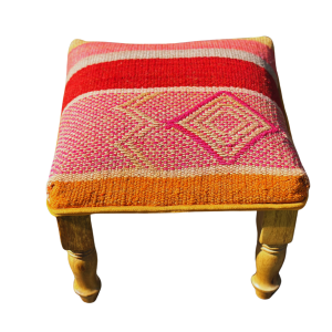 Footrest upholstered in a ethnic perubian wool rug